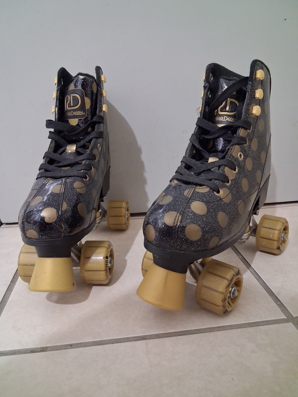 YouthBlack and Gold Polka Dot Roller Skates